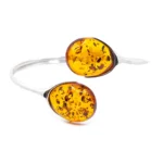 Shop the Statement Amber Torque Bangle | Elegant Baltic Beauty Jewelry