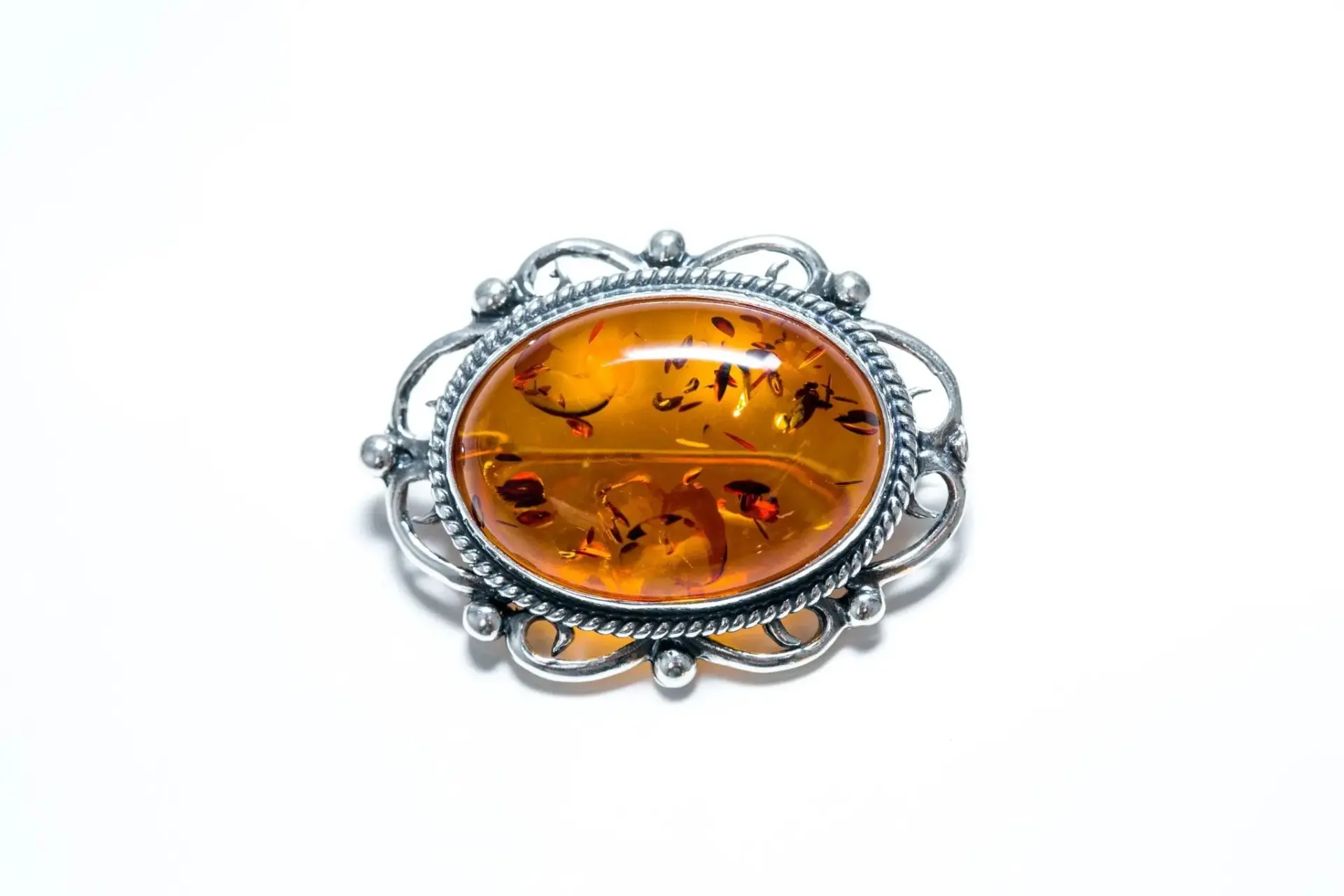 33136171_large.webp Oval Classic Framed Amber Brooch - Victorian Style, Baltic Amber & Sterling Silver - Image 1