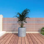Elegant Poly Stone Cylindrical Planter - Aged Concrete, 24" Diameter, 26" High - Durable & Weather-Resistant Planter with Drainage Holes - Image 4