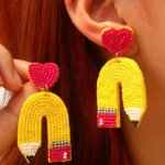 Charming Yellow Heart Pencil Earrings - Unique Playful and Sophisticated Design