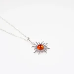 Amber Sun Charm Pendant - Baltic Amber & Sterling Silver | Radiant Jewelry Piece