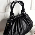 Chic Faux Leather Bag with Stylish Handle Detail Perfect for Everyday Use