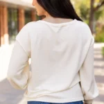 Ember Exposed Seam Knit Patchwork Top Stylish & Cozy Drop Shoulder Design