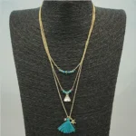 TASSELS AND TRINKETS Layered Necklace - Multi-Layered Fashion Jewelry with Turquoise Beads & Handmade Tassel